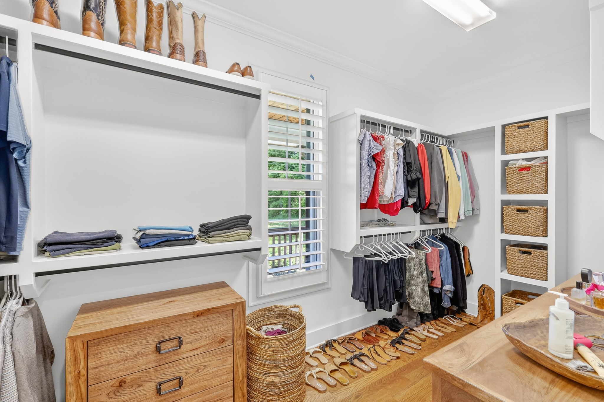 1176 Iron Bridge Road Columbia, TN 38401 - Photo 33 of 53 a view of walk in closet with clothes and shoes