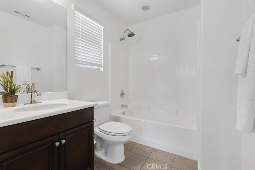 20317 Livorno Porter Ranch Porter Ranch, CA 91326 - Photo 23 of 33 a bathroom with a sink a toilet and shower