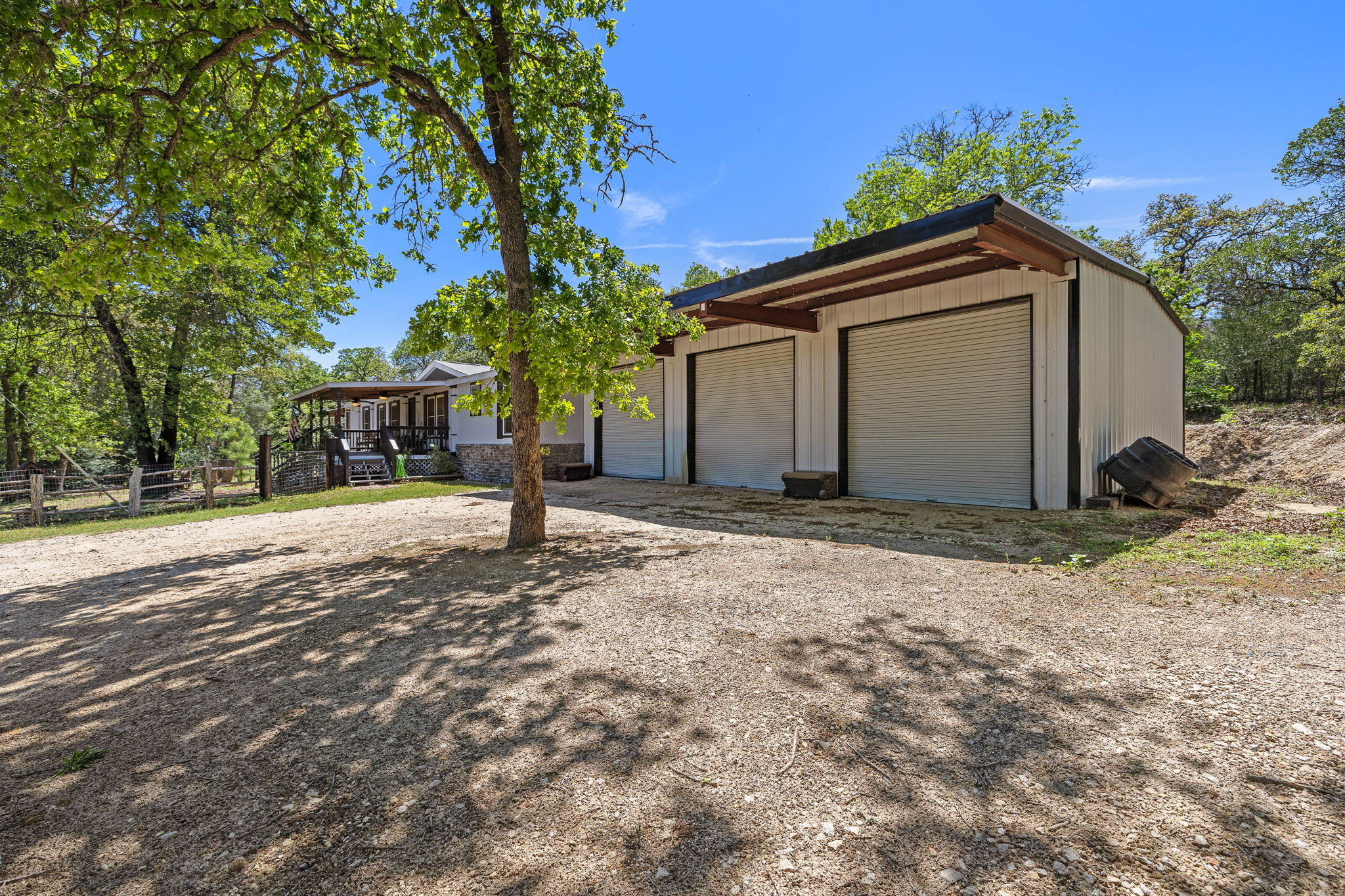 541 Hidden Oaks Drive Elgin, TX 78621 - Photo 36 of 40 WHAT A GARAGE! So much space with lofted storage too!