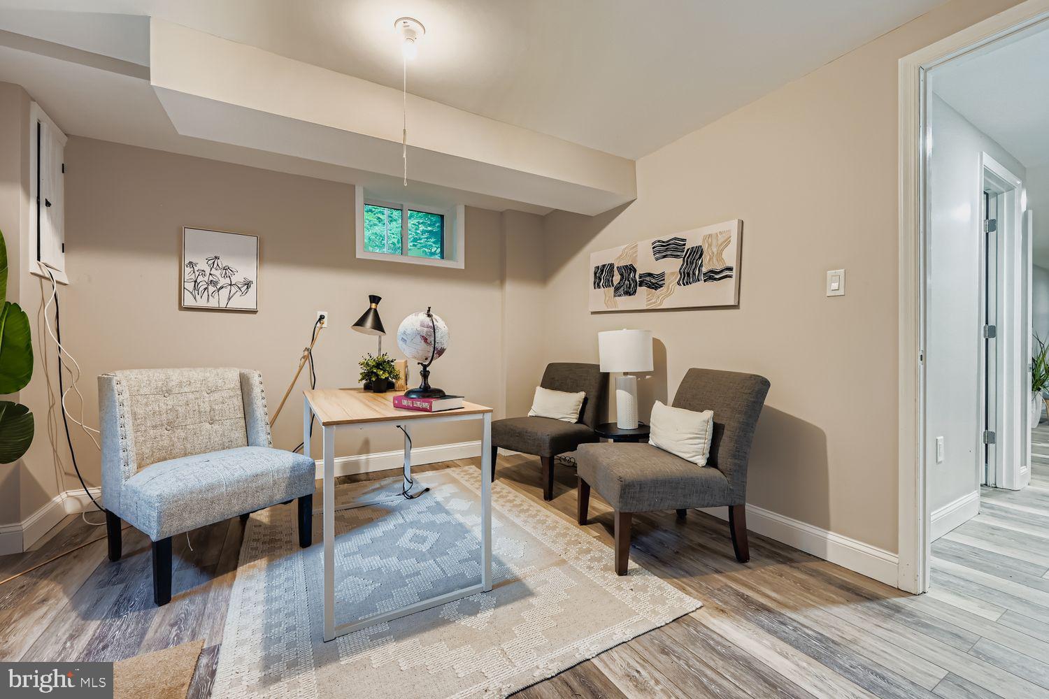 3203 Brezina Place Edgewater, MD 21037 - Photo 24 of 42 a living room with furniture and a wooden floor