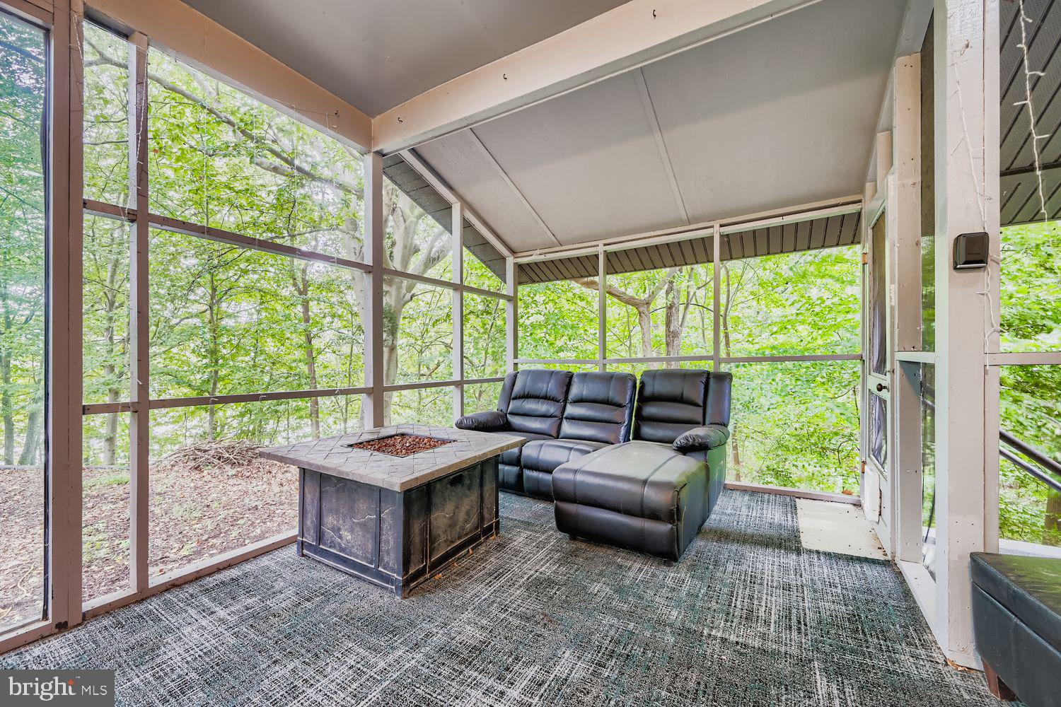 3203 Brezina Place Edgewater, MD 21037 - Photo 30 of 42 a living room with furniture and a large window