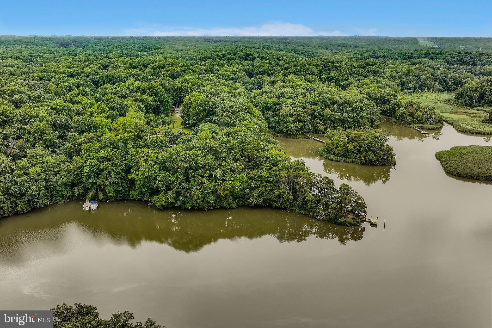 3203 Brezina Place Edgewater, MD 21037 - Photo 39 of 42 a view of a lake with a city
