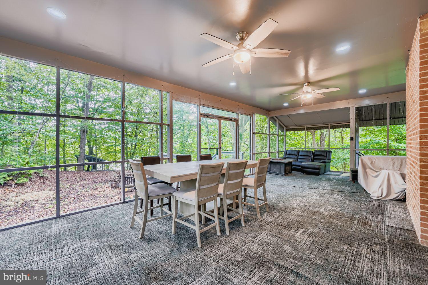 3203 Brezina Place Edgewater, MD 21037 - Photo 6 of 42 a view of a dining room with furniture window and outside view