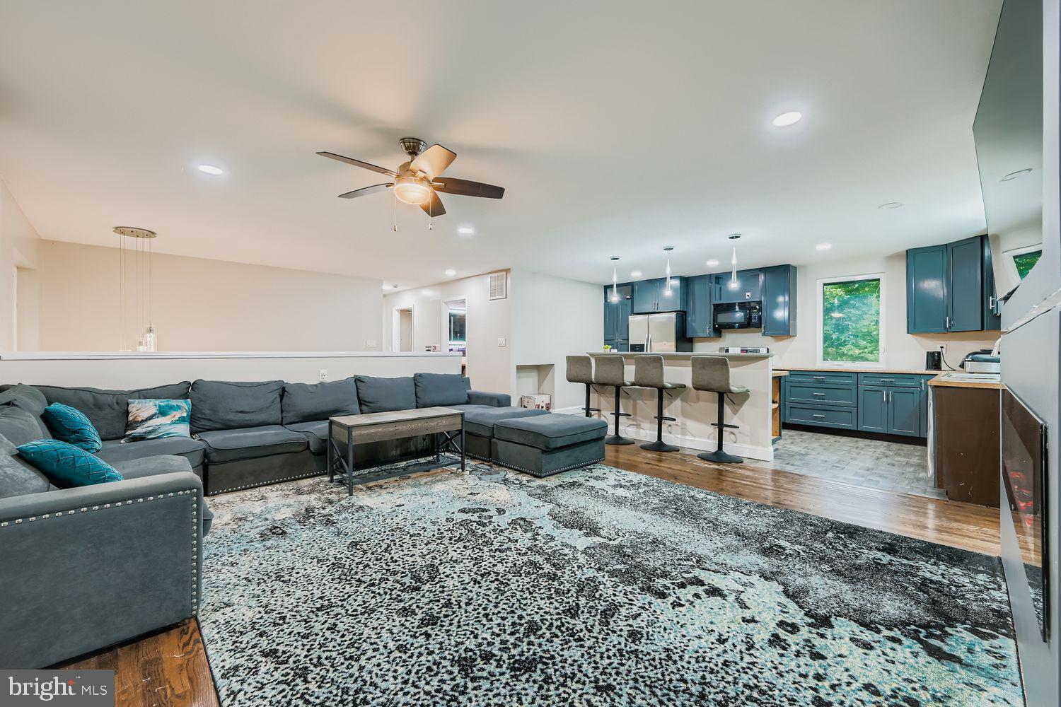 3203 Brezina Place Edgewater, MD 21037 - Photo 8 of 42 a living room with furniture and kitchen view