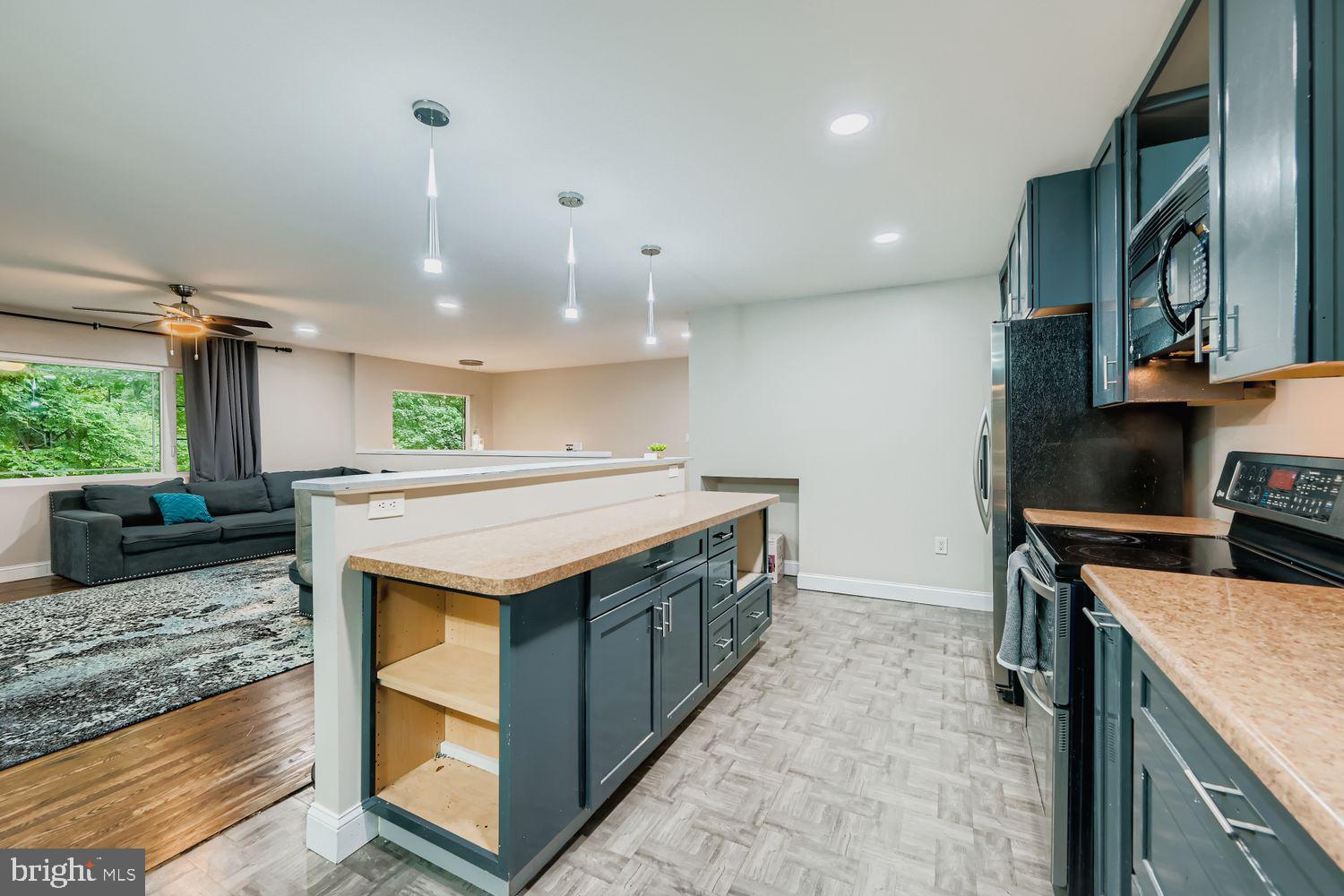 3203 Brezina Place Edgewater, MD 21037 - Photo 10 of 42 a kitchen with a stove and a sink