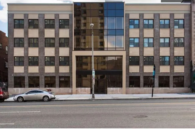 a car parked in front of a building