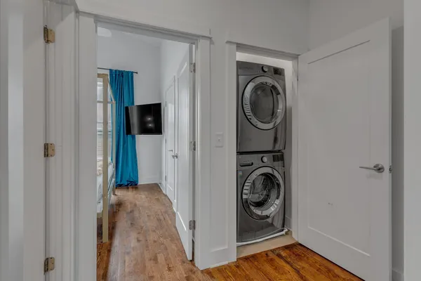 a utility room with window dryer and washer