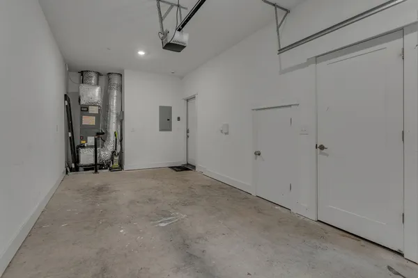 a view of empty room with ceiling fan