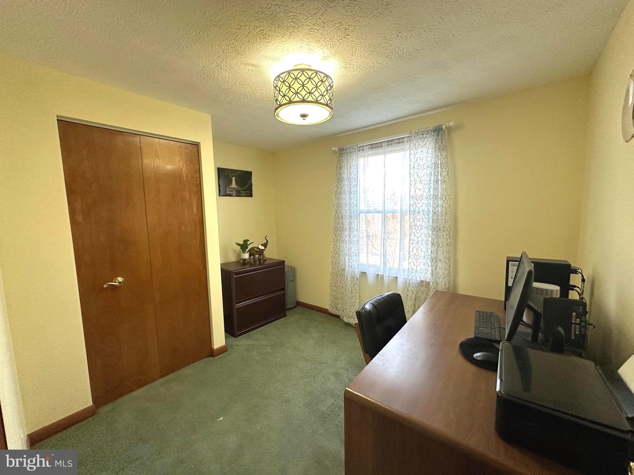 13 Cinder Road Lutherville-Timonium, MD 21093 - Photo 19 of 28 a view of a livingroom with furniture and windows
