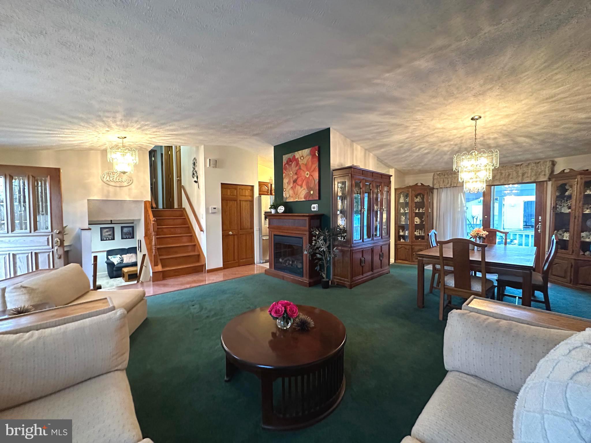 13 Cinder Road Lutherville-Timonium, MD 21093 - Photo 2 of 28 a living room with furniture and a wooden floor