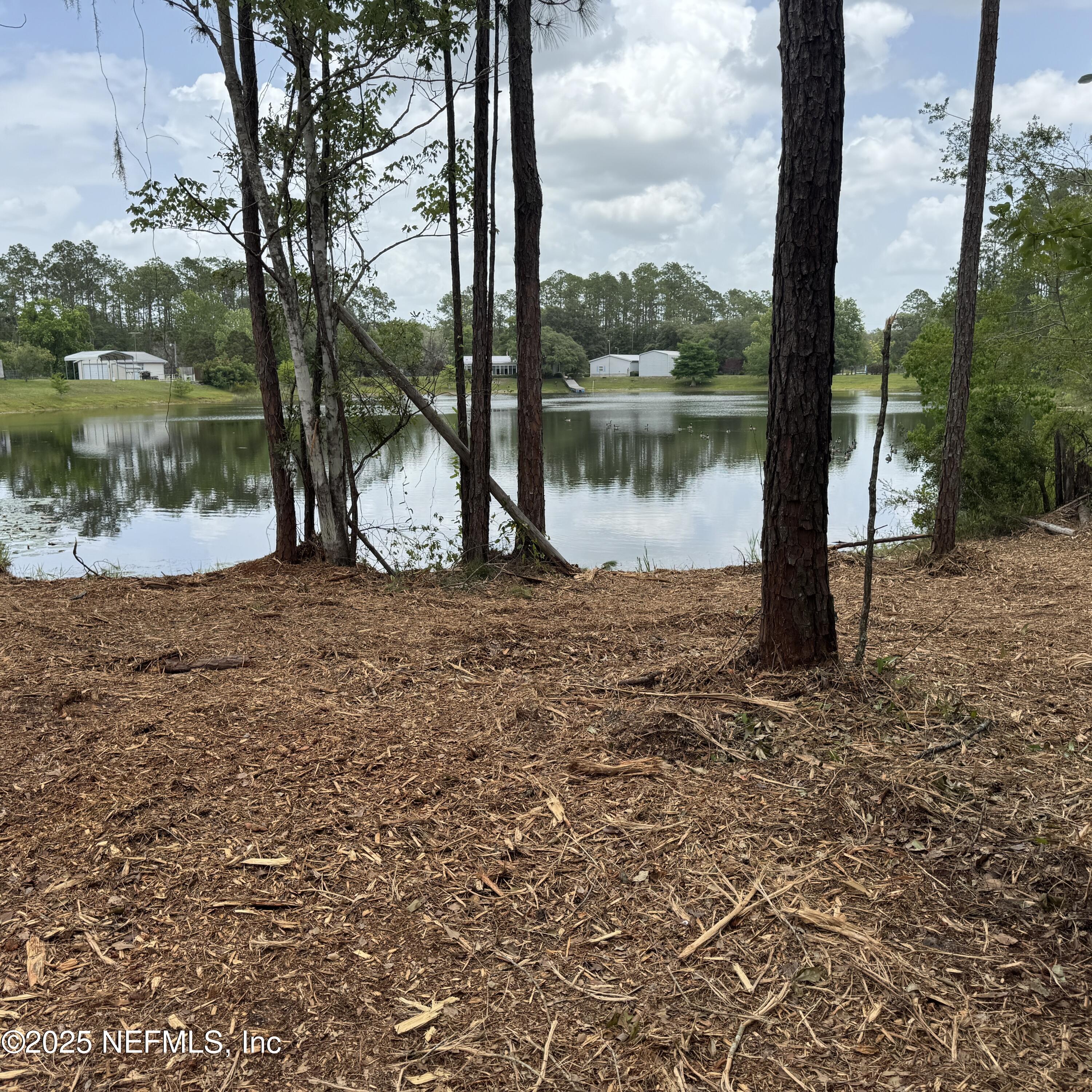 0 Wallace & Glen Interlachen, FL 32148 - Photo 1 of 7 a lake view with a lake view