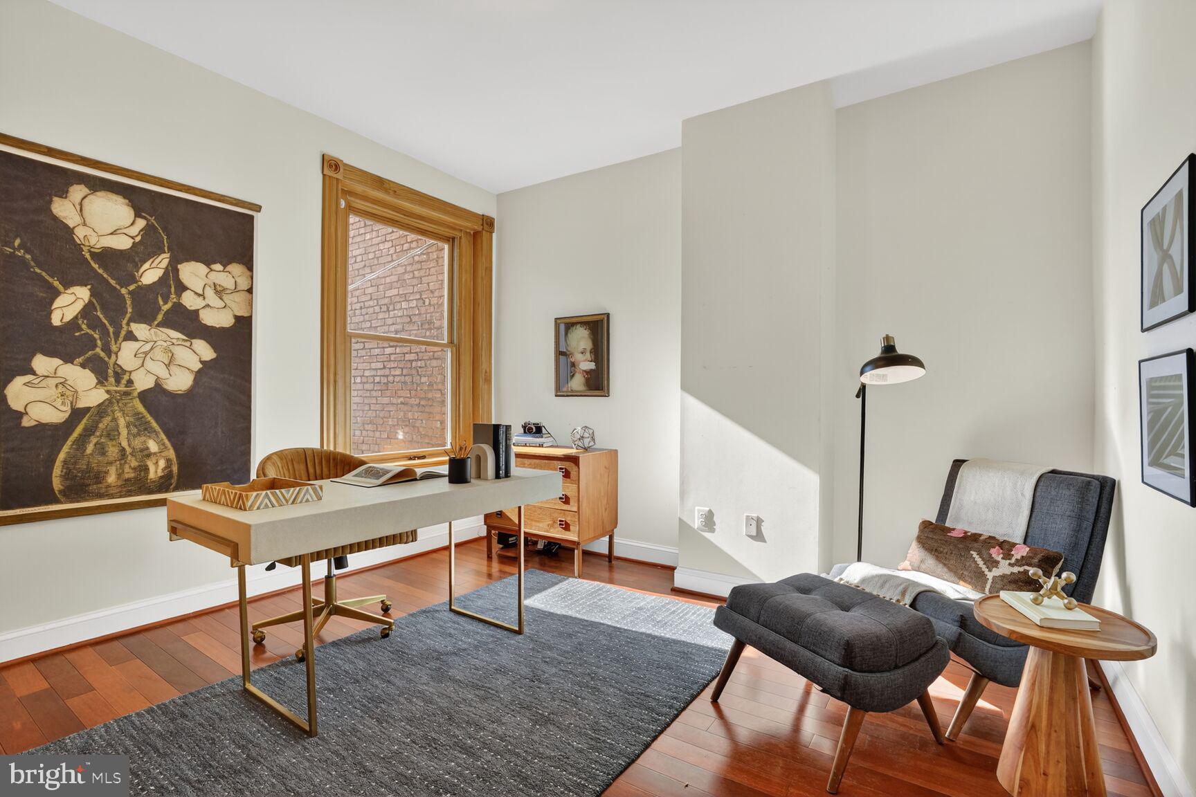 1634 R Street Northwest Washington, DC 20009 - Photo 22 of 30 a workspace with furniture and a window