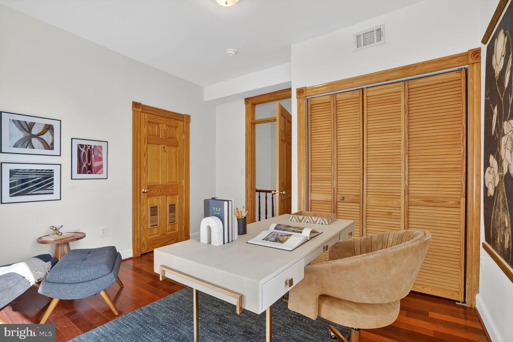 1634 R Street Northwest Washington, DC 20009 - Photo 23 of 30 a living room with furniture and a window