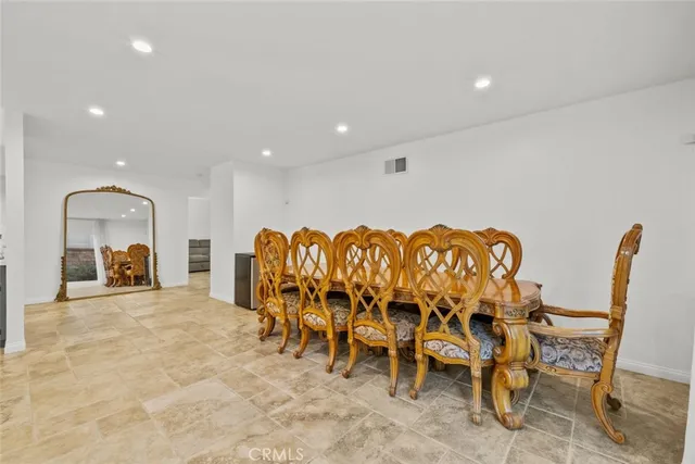 a kitchen with stainless steel appliances granite countertop a stove and a sink