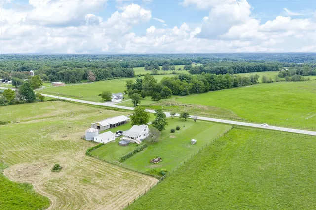 an aerial view of a house with garden space