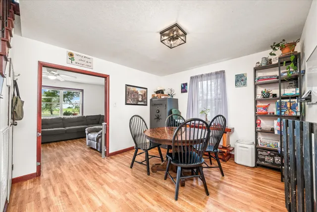 a kitchen with stainless steel appliances a refrigerator and a stove top oven