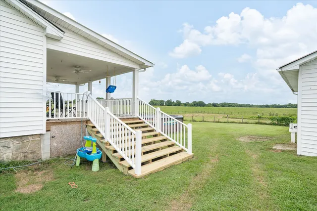 swimming pool view with a garden space