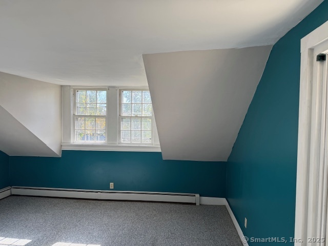 41 Spring Street Windham, CT 06226 - Photo 13 of 15 a view of an empty room with a window
