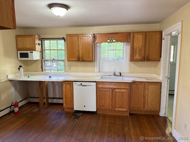 41 Spring Street Windham, CT 06226 - Photo 2 of 15 a kitchen with granite countertop wooden floors a sink and a window