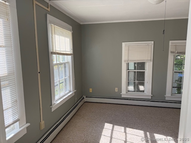 41 Spring Street Windham, CT 06226 - Photo 9 of 15 en empty room with a window