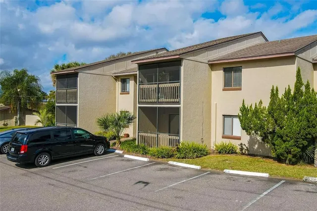 a car parked in front of a house
