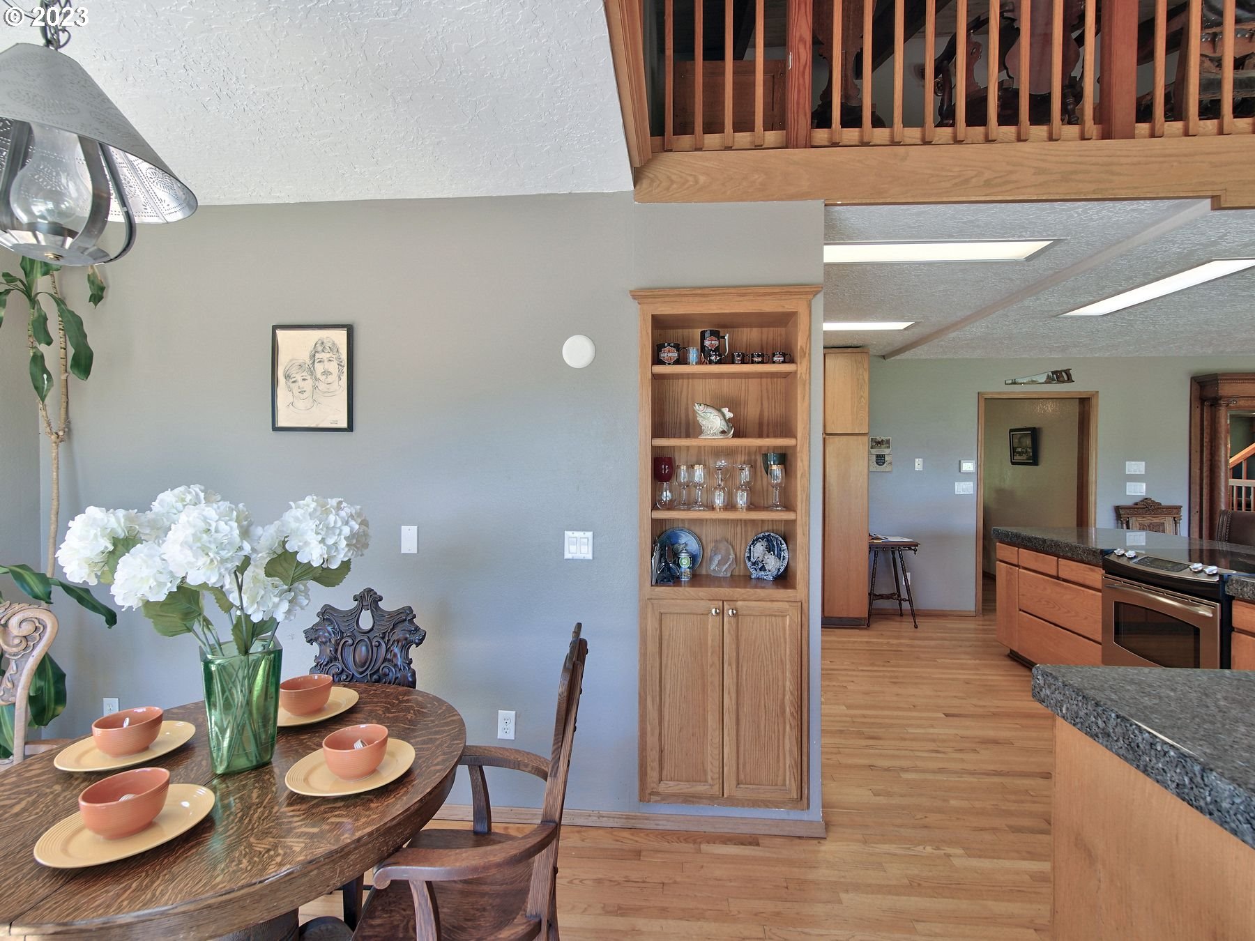 12773 South Union Hall Road Canby, OR 97013 - Photo 13 of 47 a dining room with furniture and wooden floor