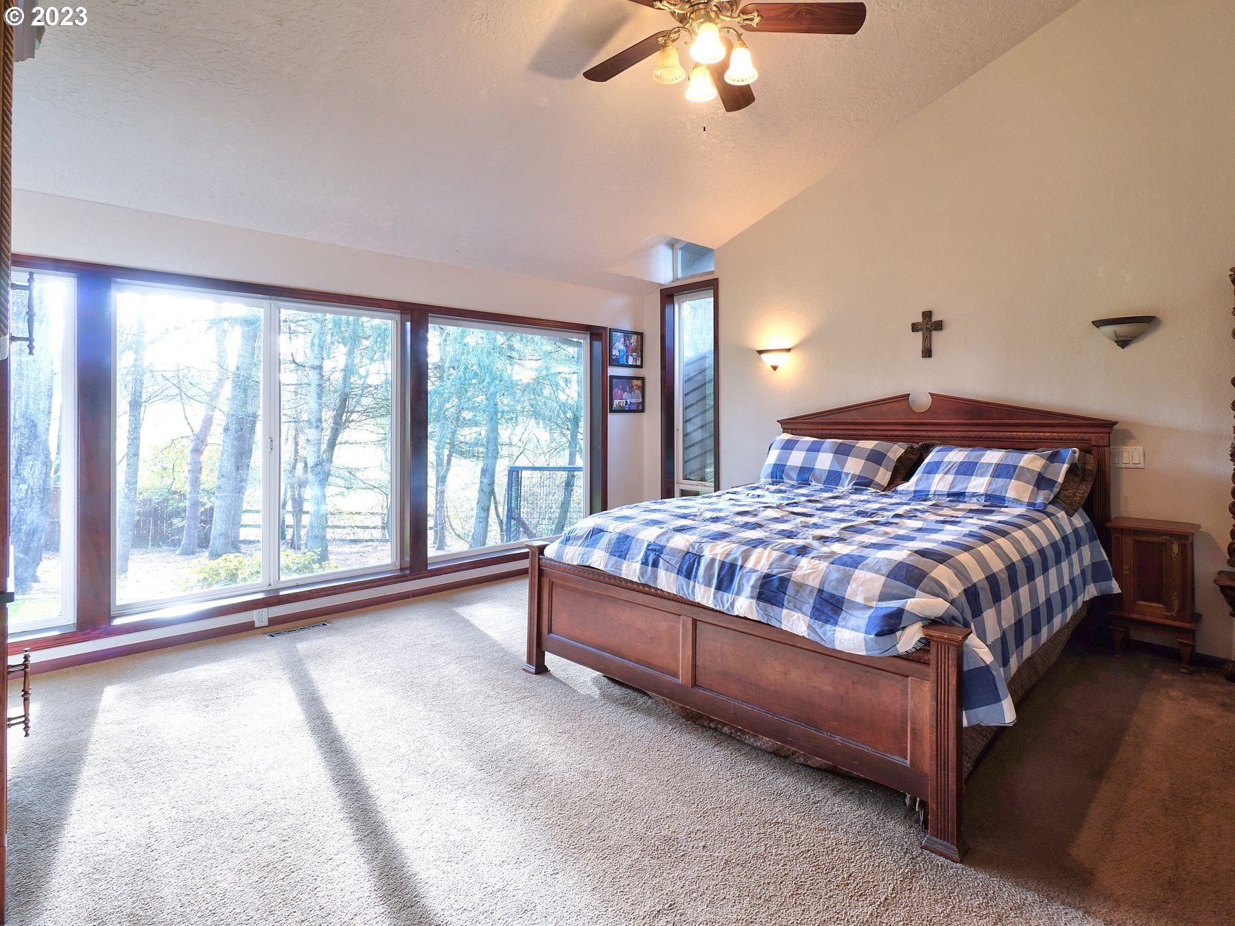 12773 South Union Hall Road Canby, OR 97013 - Photo 29 of 47 a bedroom with a large bed and a large window