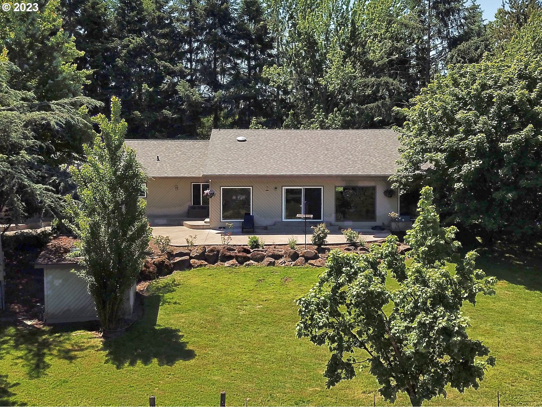 12773 South Union Hall Road Canby, OR 97013 - Photo 38 of 47 a aerial view of a house with swimming pool garden and patio