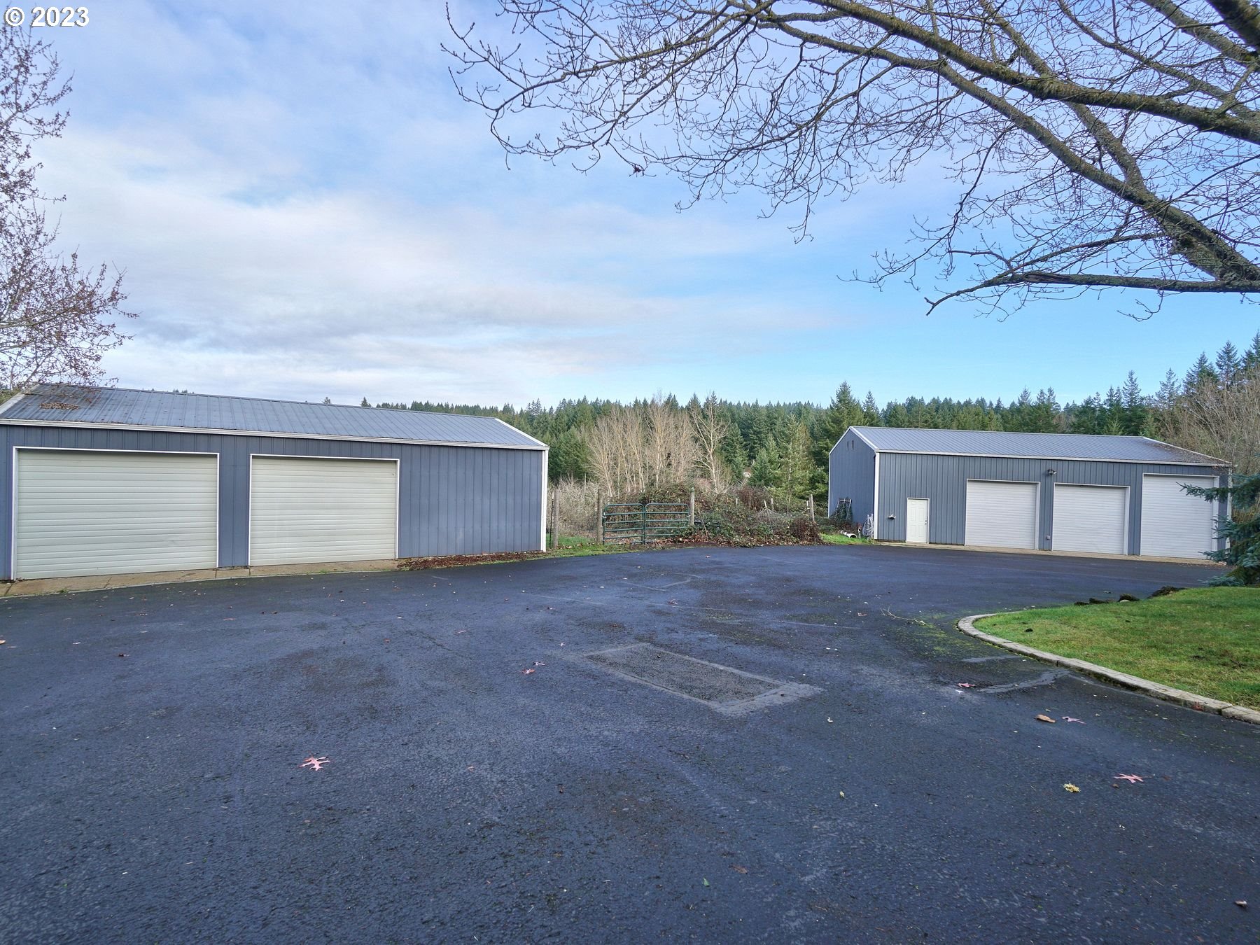 12773 South Union Hall Road Canby, OR 97013 - Photo 40 of 47 a view of a house with a yard and garage