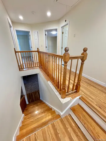 a view of entryway with wooden floor