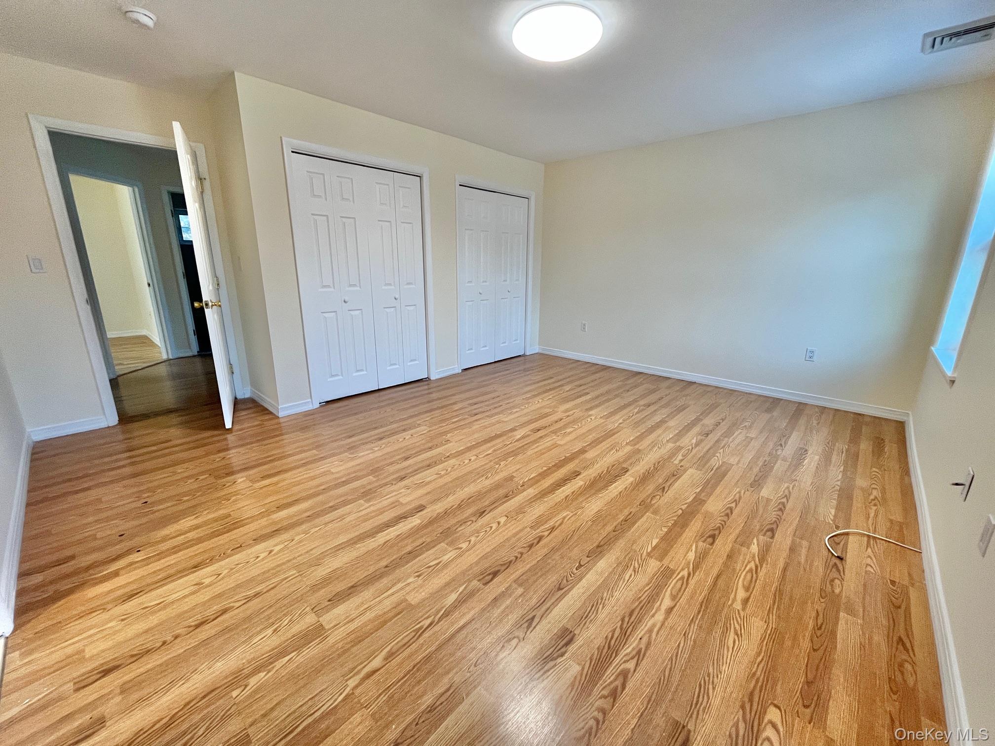 51 Emmett Terrace, Unit 1 New Rochelle, NY 10805 - Photo 21 of 23 wooden floor in an empty room