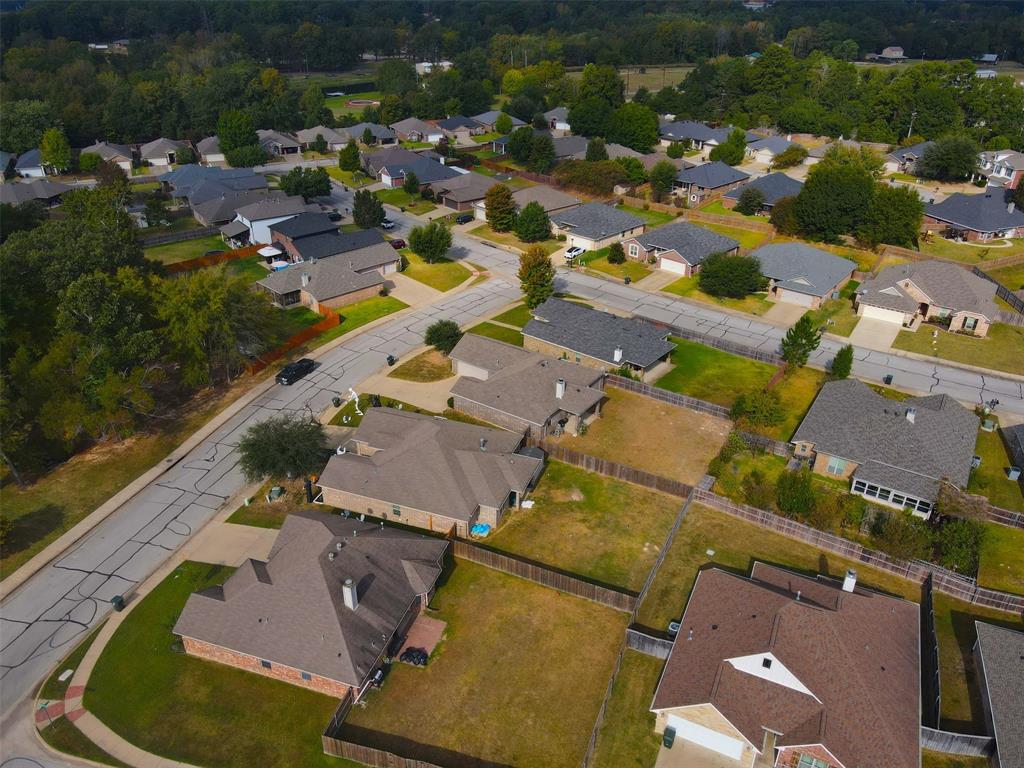 2512 Guinn Farms Road Tyler, TX 75707 - Photo 8 of 29 an aerial view of residential houses with outdoor space