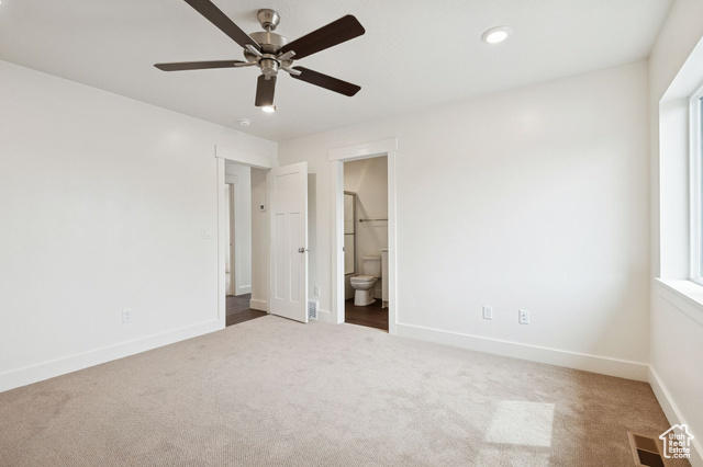 1615 North Angel Street, Unit I Layton, UT 84041 - Photo 27 of 56 Unfurnished bedroom featuring carpet, ceiling fan, ensuite bathroom, and recessed lighting