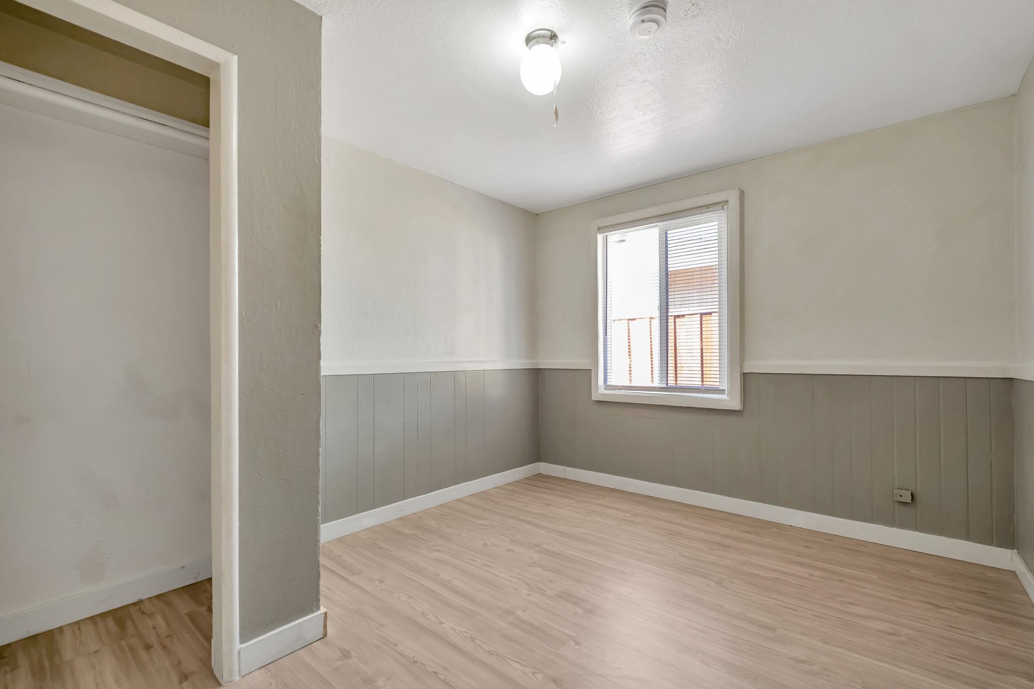 118 Sycamore Street Fremont, CA 94536 - Photo 19 of 30 a view of empty room with wooden floor and fan