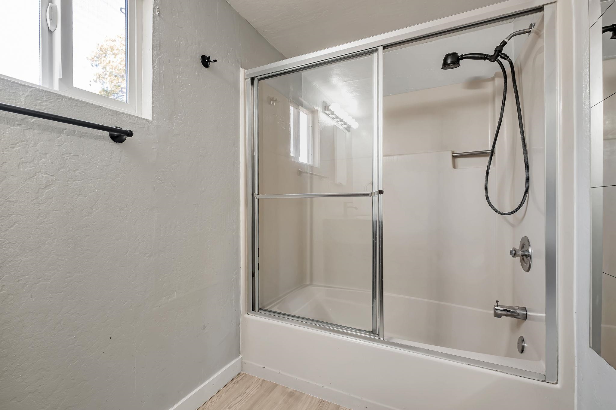 118 Sycamore Street Fremont, CA 94536 - Photo 22 of 30 a bathroom that has a glass shower door