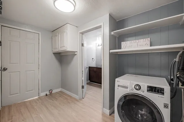 a view of a roof deck with wooden floor and fence