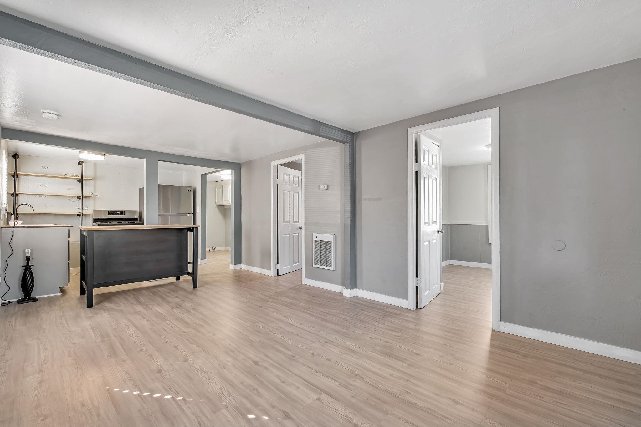 118 Sycamore Street Fremont, CA 94536 - Photo 7 of 30 a view of a kitchen with a sink and a refrigerator