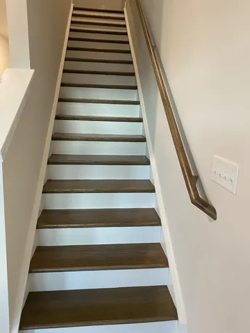 an empty room with closet area