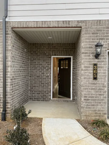 a front view of a house with a shower