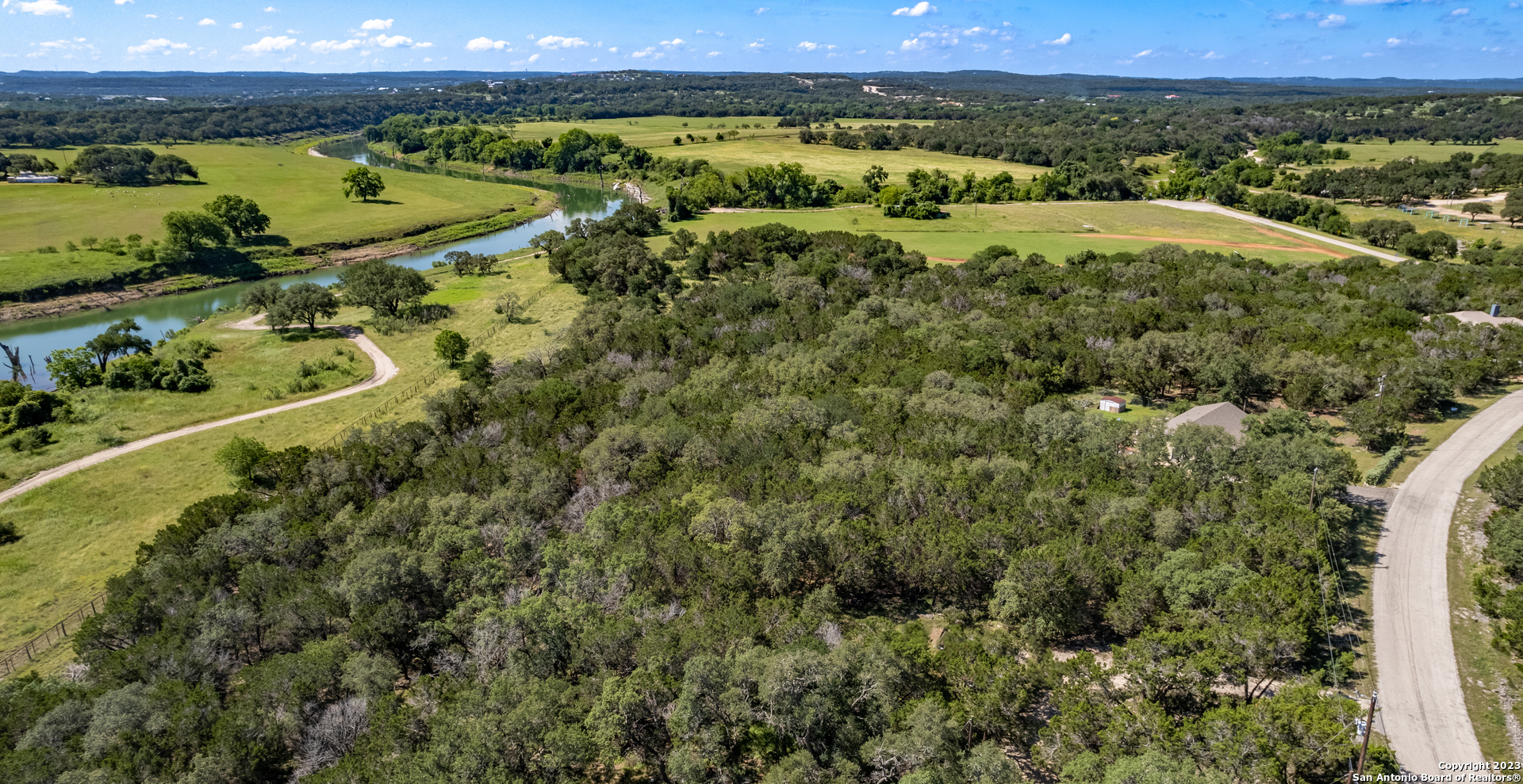 a view of a city with a lake