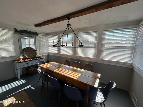 a room with furniture and window