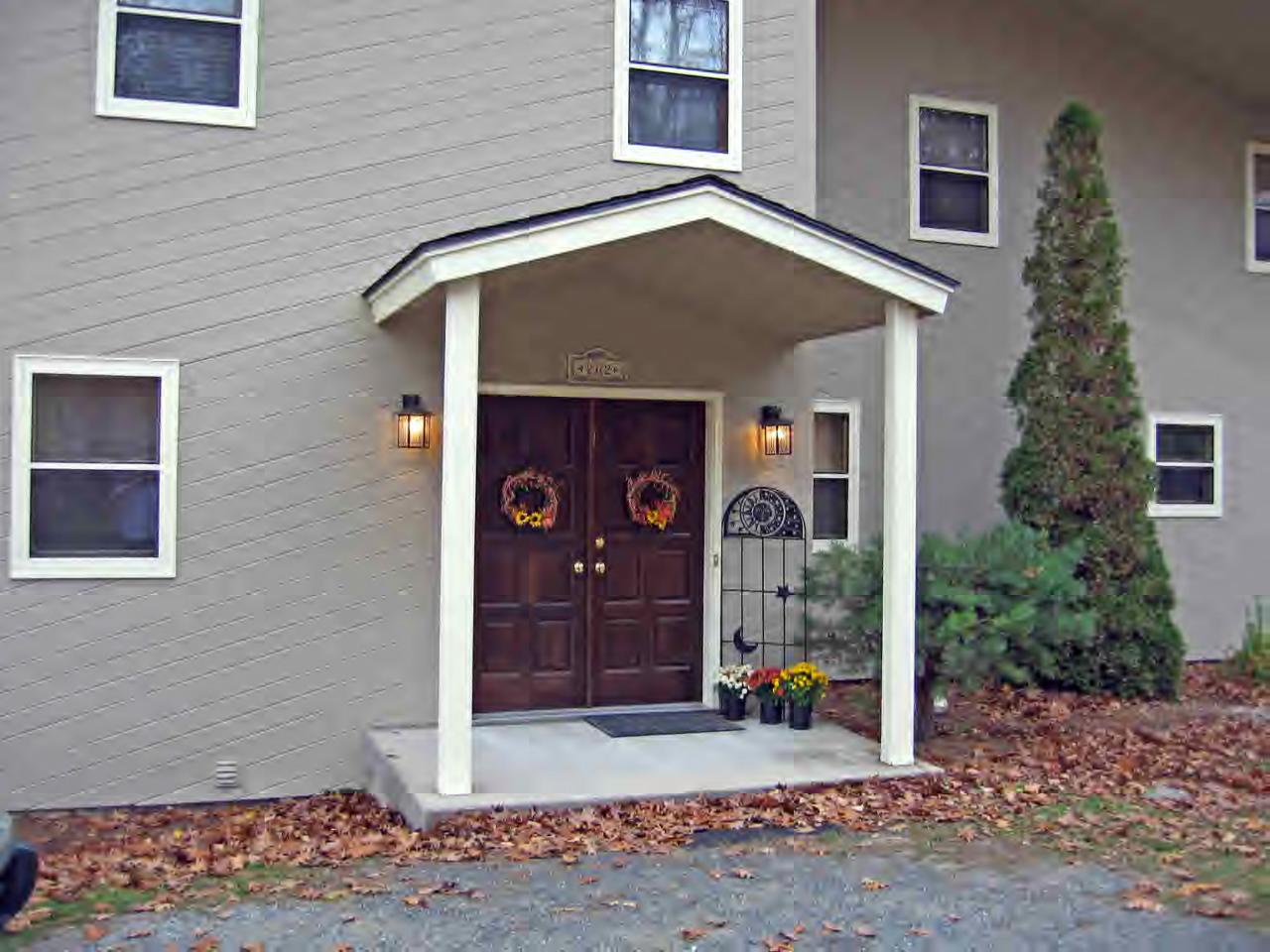 262-264 Kibbe Road Otis, MA 01029 - Photo 3 of 16 a front view of a house