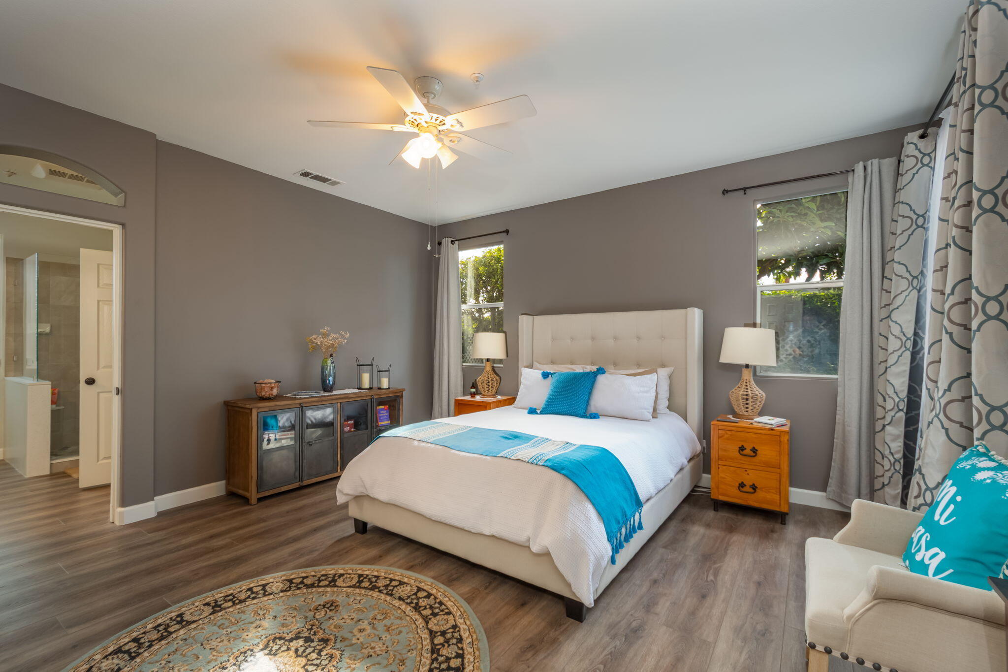 115 Ford Avenue Ventura, CA 93003 - Photo 13 of 33 a bedroom with a bed and wooden floor