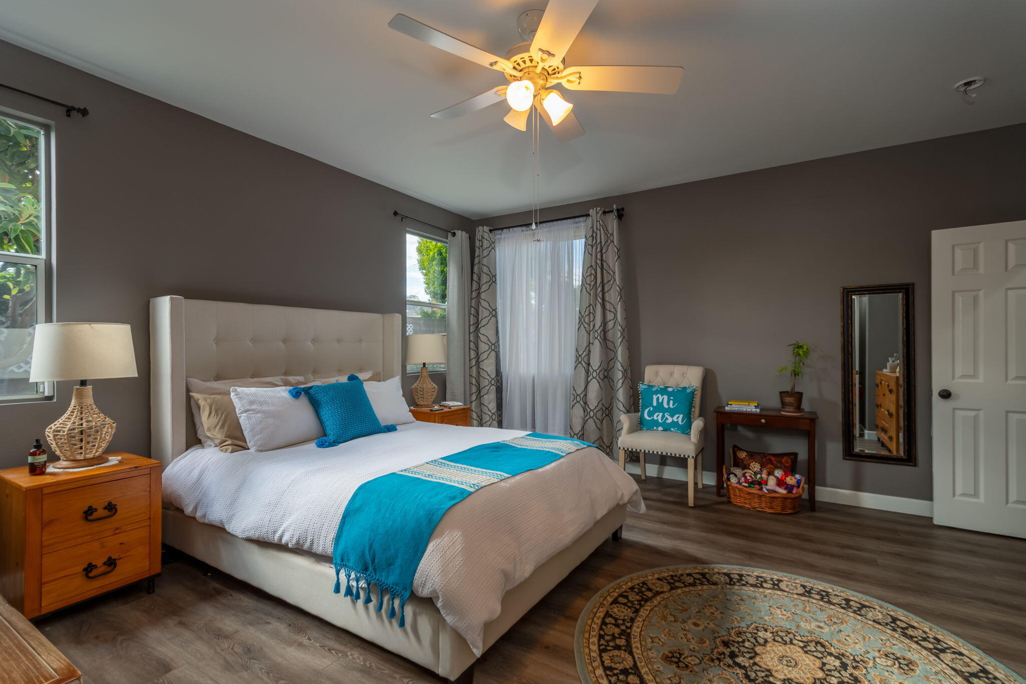 115 Ford Avenue Ventura, CA 93003 - Photo 14 of 33 a bedroom with a bed and a chandelier