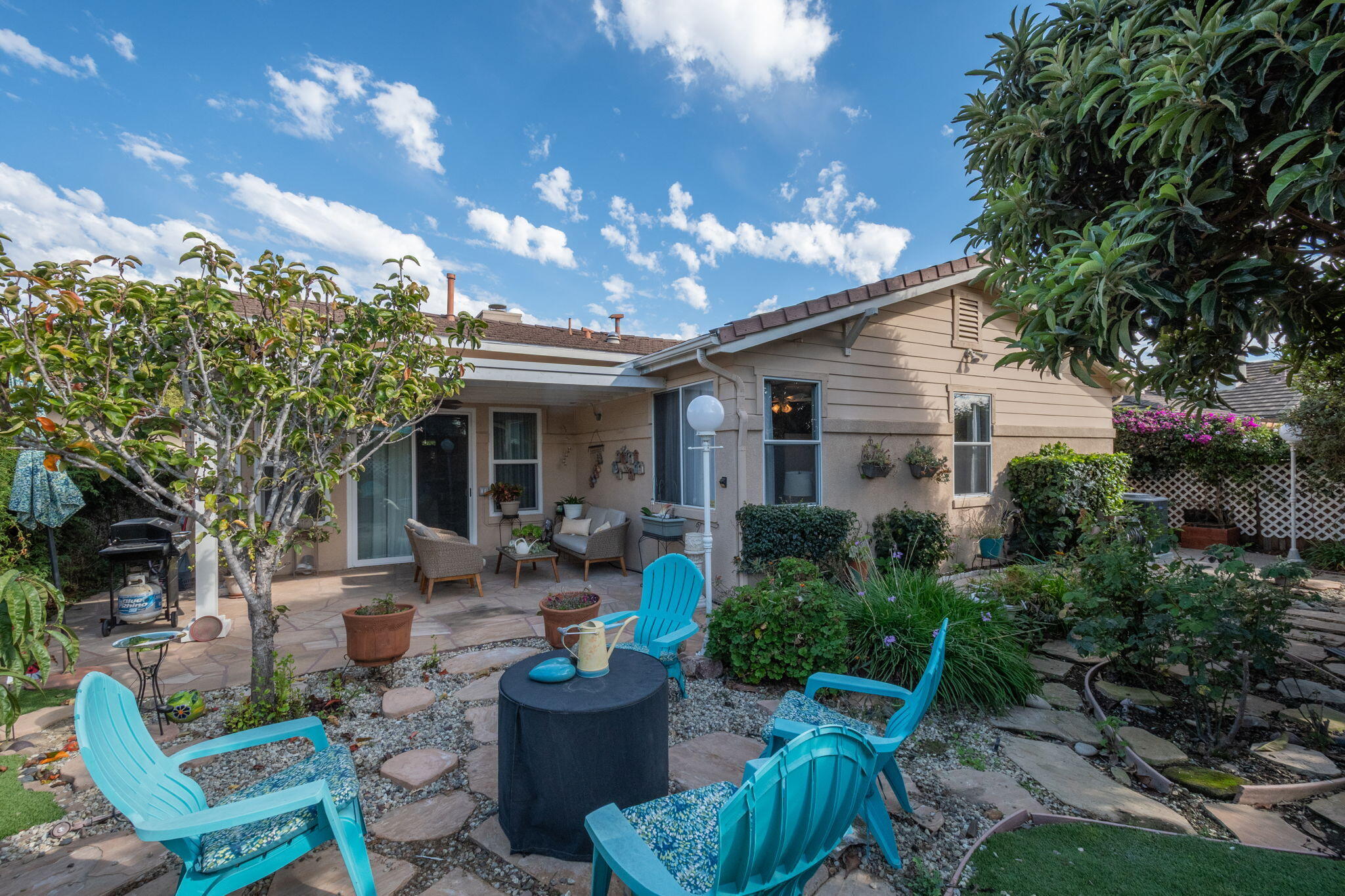 115 Ford Avenue Ventura, CA 93003 - Photo 26 of 33 a view of a house with patio chairs and tables