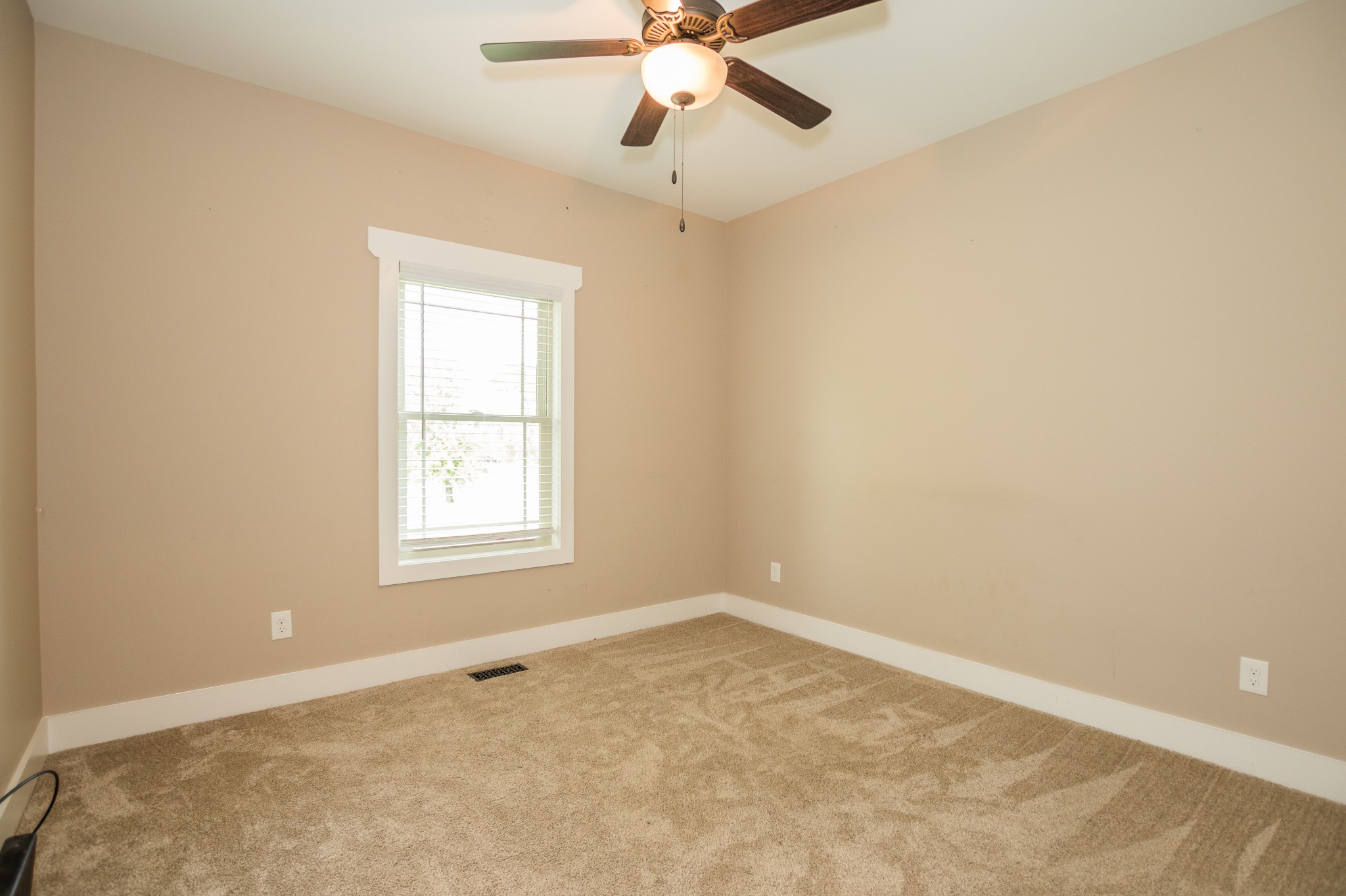 3597 Thompson Road Rockvale, TN 37153 - Photo 14 of 23 an empty room with a window and a fan