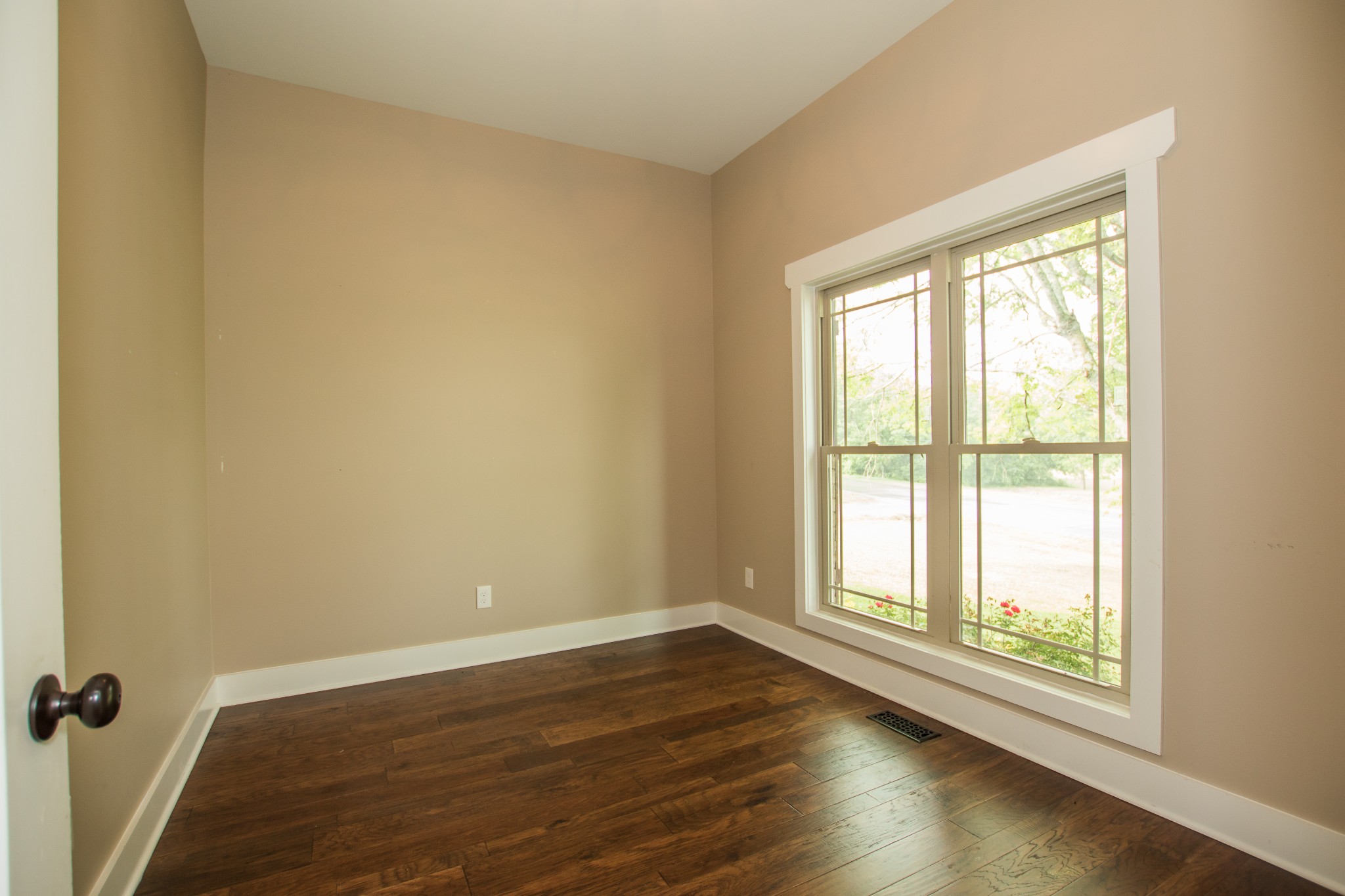 3597 Thompson Road Rockvale, TN 37153 - Photo 15 of 23 an empty room with wooden floor and windows
