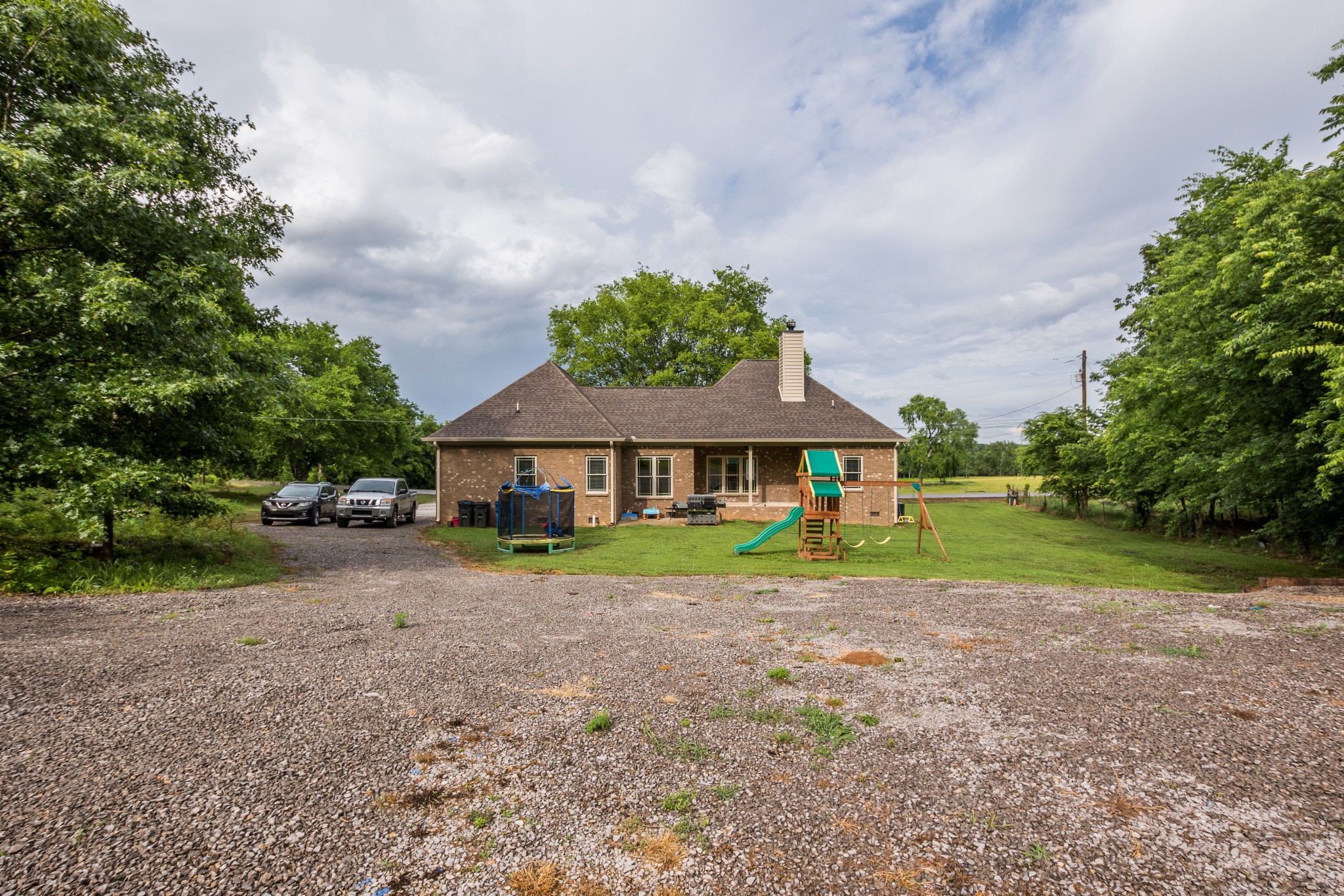 3597 Thompson Road Rockvale, TN 37153 - Photo 19 of 23 a front view of a house with garden