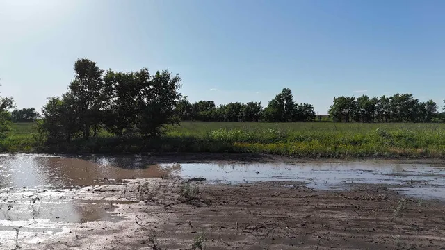 a view of outside space with a lake view