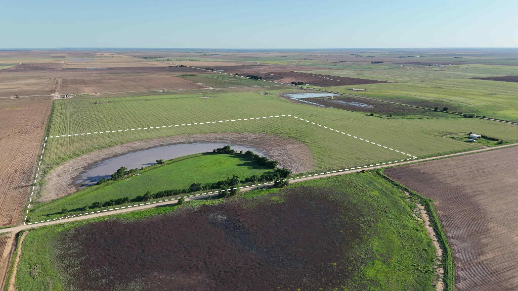 632 County Road 230 Post, TX 79356 - Photo 4 of 28 a view of a lake with a beach